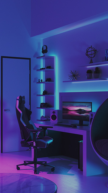 此圖片顯示書桌佈置的 Nanoleaf Essentials 燈帶。 變色 RGB 燈帶帶來了良好的背景光和光照，使之成為進行遊戲以及設定房間內理想氛圍的最佳選擇。