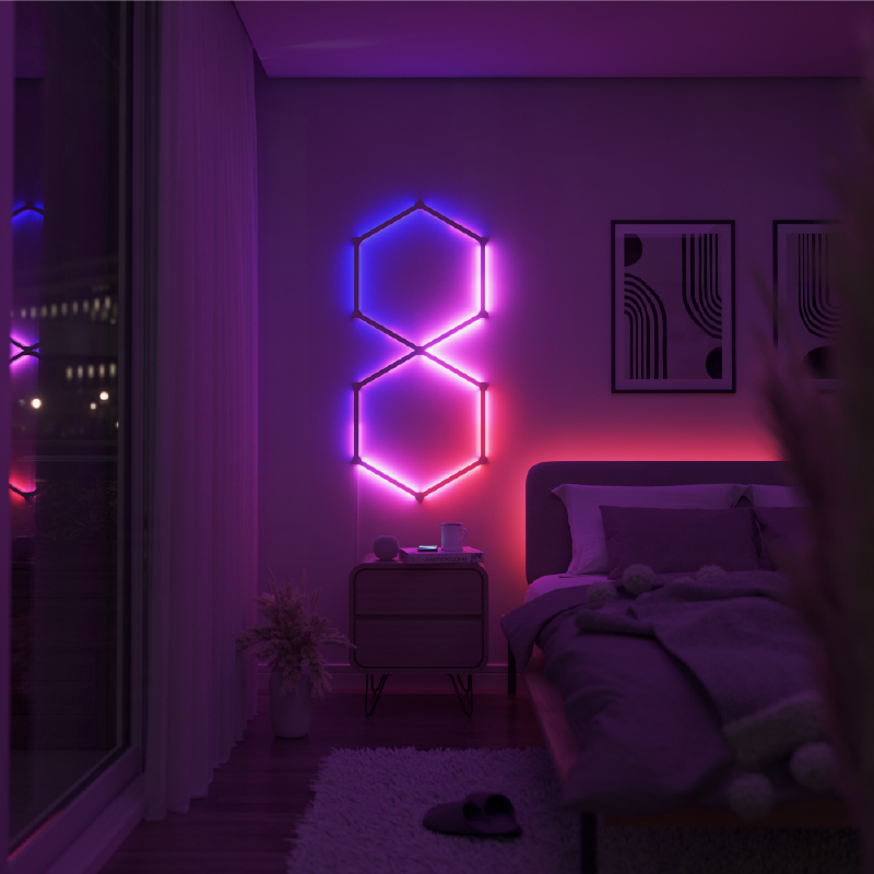 Garis cahaya dengan lampu latar modular pintar yang dapat berubah warna dengan Thread Nanoleaf Lines yang dipasang pada dinding di kamar tidur. HomeKit, Google Assistant, Amazon Alexa, IFTTT. 