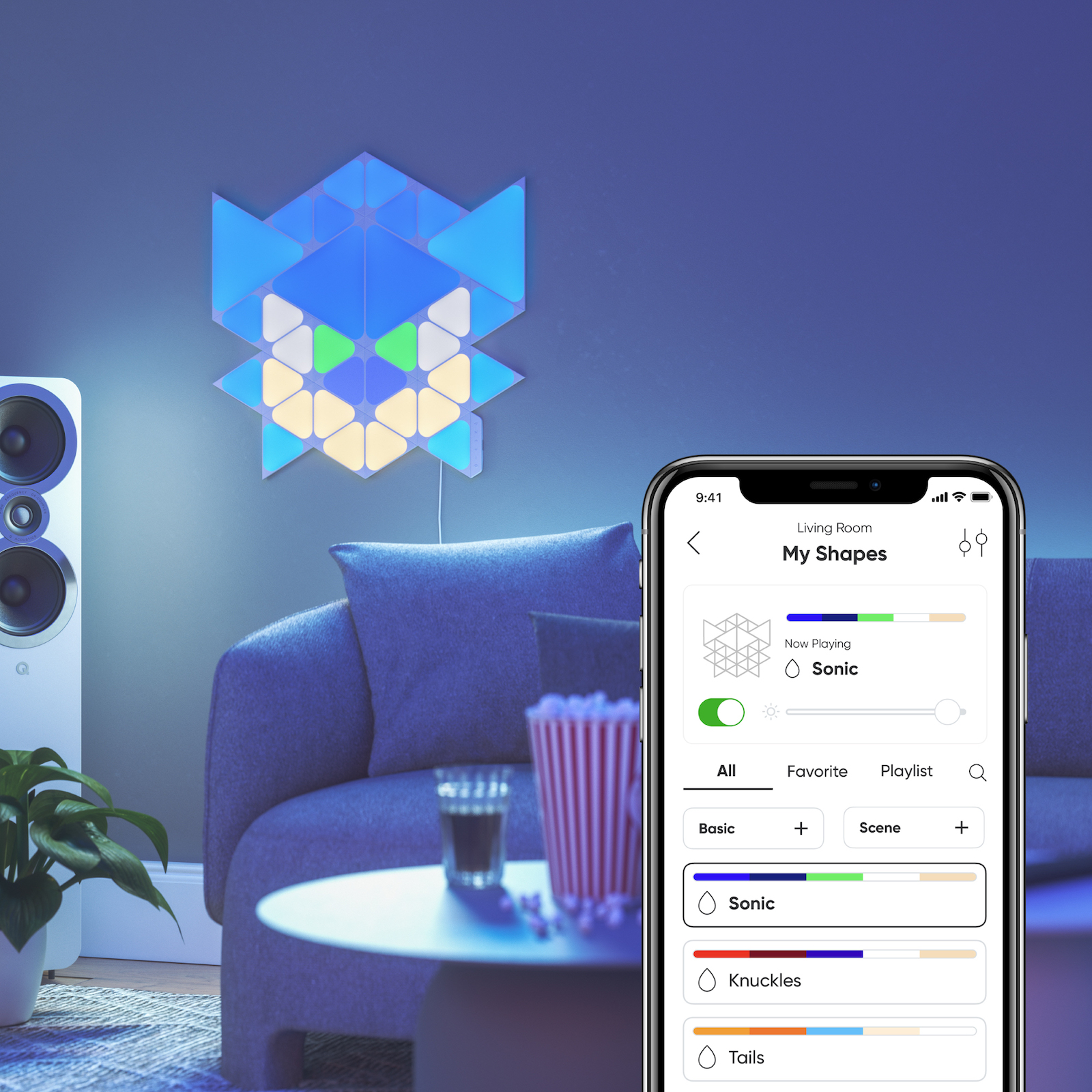 Nanoleaf Shapes Thread enabled color changing triangle and mini triangle smart modular light panels mounted to a wall in a living room as Sonic. Sonic the Hedgehog 2. Ứng dụng Nanoleaf. Tương tự với Philips Hue, Lifx. HomeKit, Trợ lý Google, Amazon Alexa, IFTTT.
